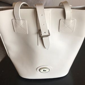 Dooney and Burke vintage cream medium bag
